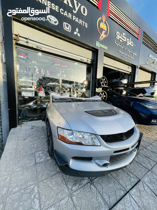 Mitsubishi Lancer Evolution 9  وارد اليابان ممشى قليل بحالة ممتازه متوفره كامله