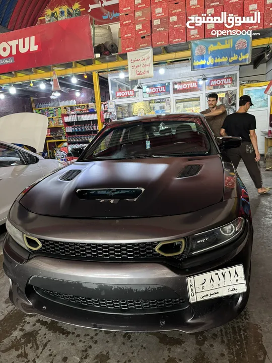 جارجر sxt  لون فيلي رقم بغداد باسمي