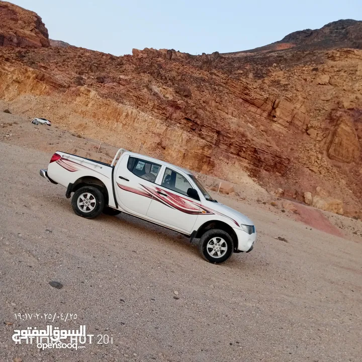بك اب متسوبيشي   l200 موديل 2009 فور ويل 4X4