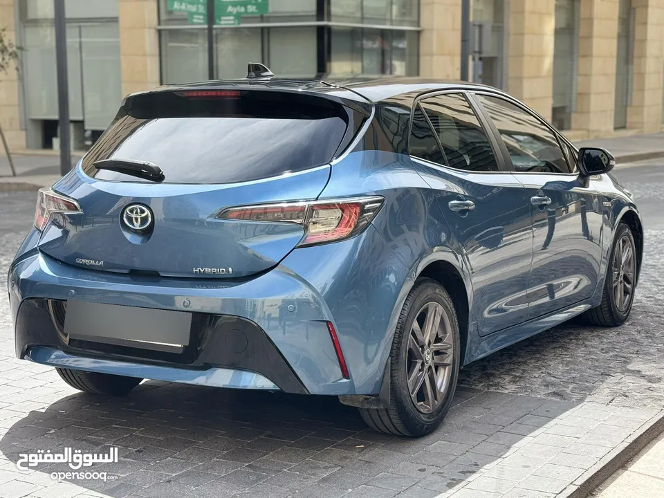 ‎تويوتا كورولا 2020 هاتشباك هايبرد (حرة جديد) بحالة الوكالة مميزة