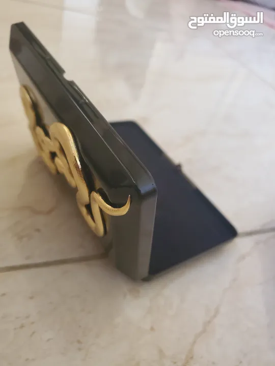 حقيبة كلاتش من ماركة كيليان ذا تمبتريس سوداء وراقيه ،Black Clutch The Temptress by Kilian