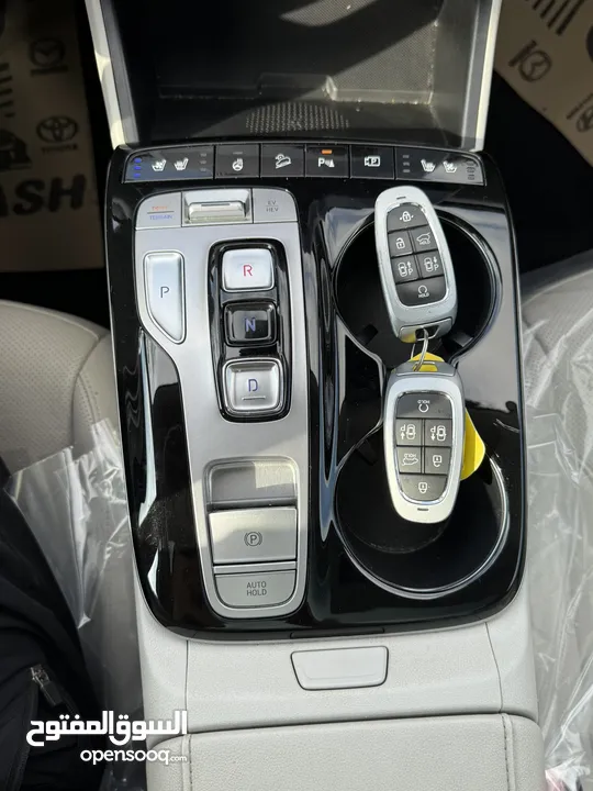 هونداي توسان ترخيص 2022 محرك 1600 هايبرد plug in/يقطع على الشحنه 65 كيلو متر