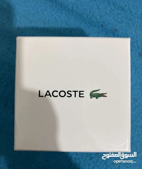 Lacoste watch sport analog white)غير قابل للتفاوض