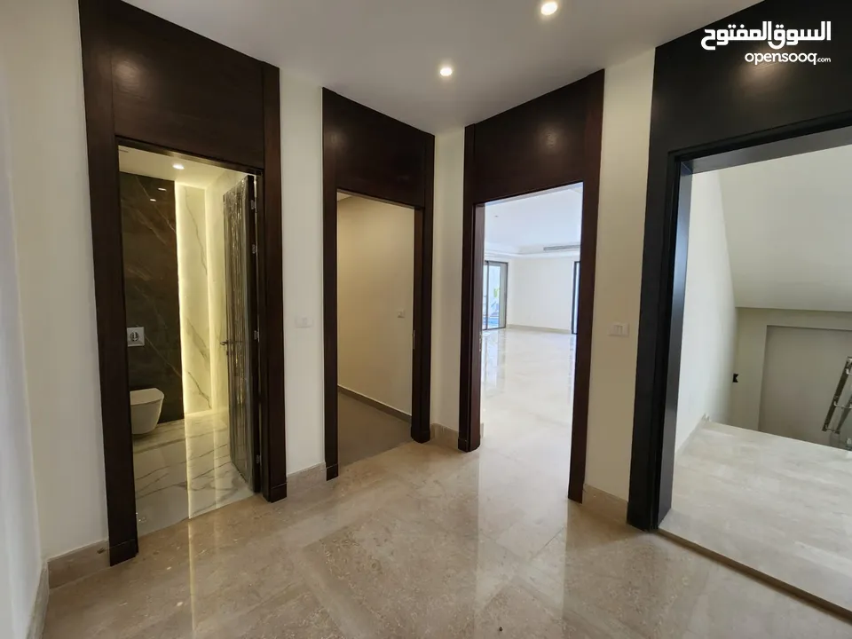 شقة طابقية فاخرة للبيع في عبدون  ref : 14383