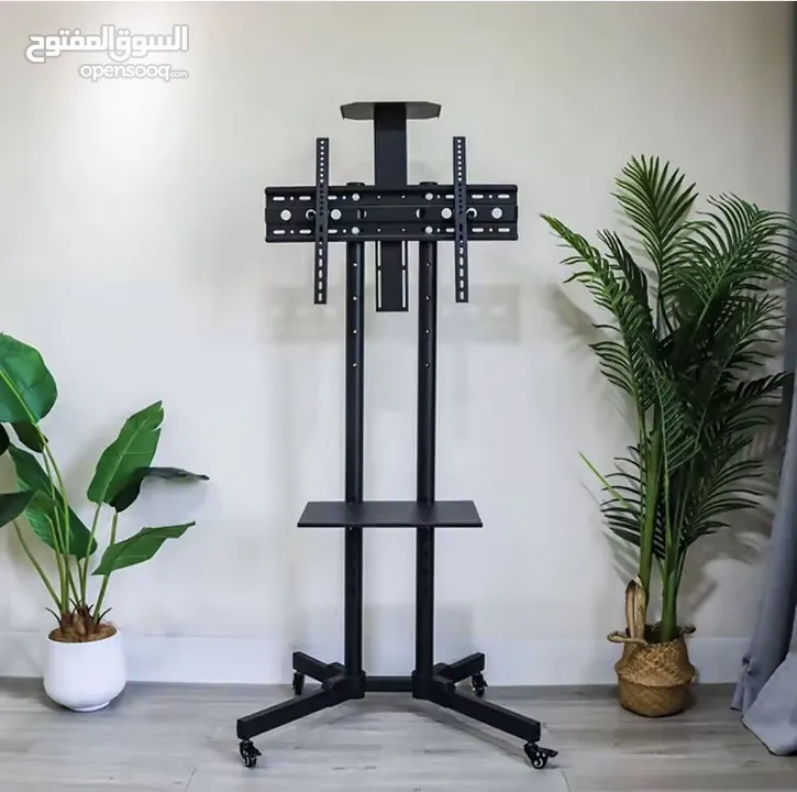 ستاند تلفزيون متحرّك بجودة عالية وتصميم عصري لو عندك شاشة كبيرة وبدك حامل قوي وثابت او بدك تنقل شاشة