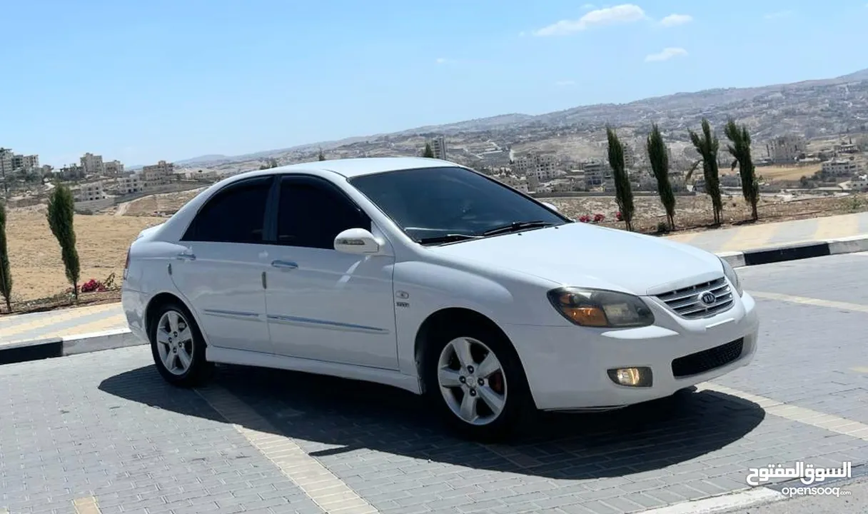 كيا سيراتو 2008 ماتور 1600 بنزين اوتومات عدد 2 لون ابيض ولون اسود
