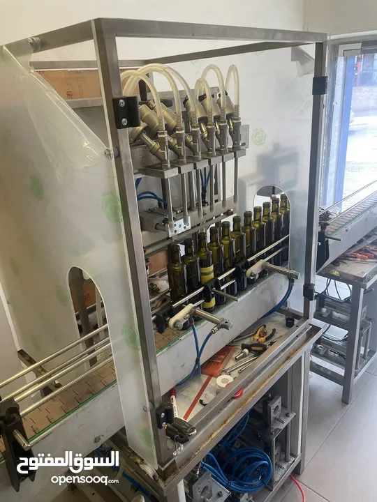 ماكنة تعبئة سوائل Liquids Filling  لأصحاب المصانع والمعامل والمشاريع الصغيرة Machine