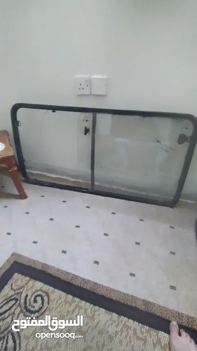 زجاج باص بريجو الباب سحاب للبيع وغال باب ويد باب ومنفاخ الجمل وبعض قطع باص بريجو كيا