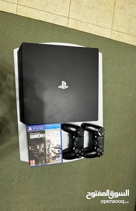 PS4 pro 1t +ايدتين + سيدي gta