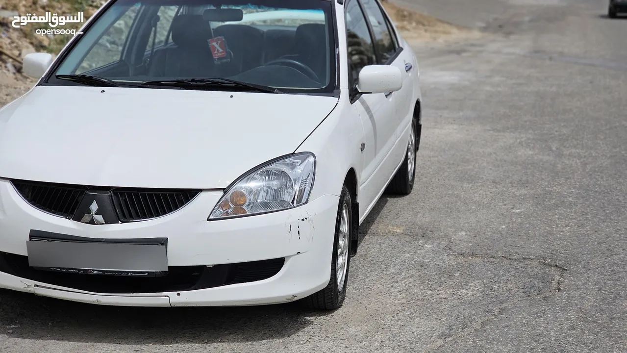 لانسر 2004