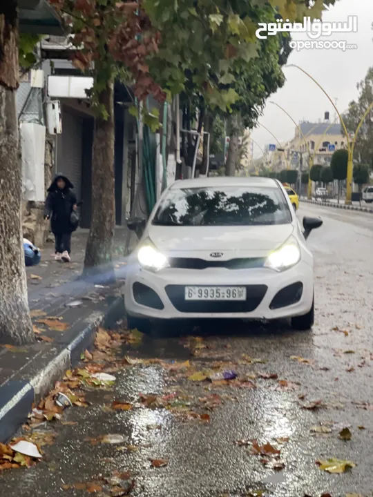كيا ريو موديل 2013متور 1400تيربو ديزل اصل عمومي سياره بسعر حرق على كاش فقط