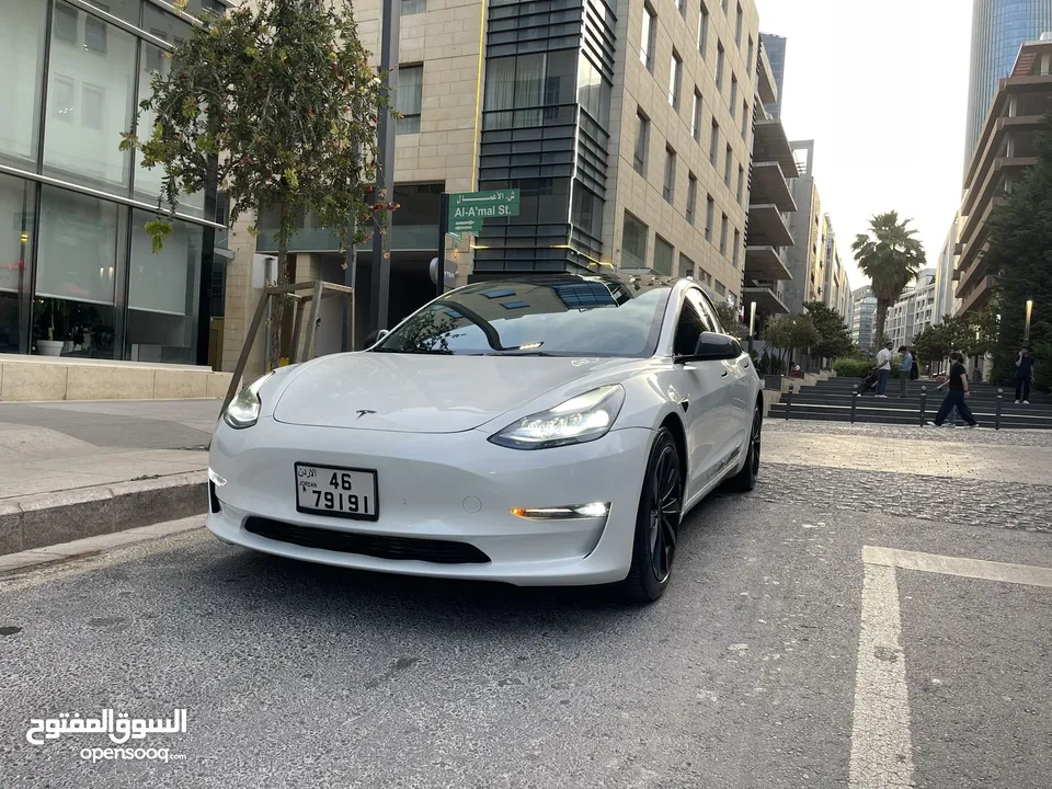 تسلا لون ابيض جمرك اليوم 2023