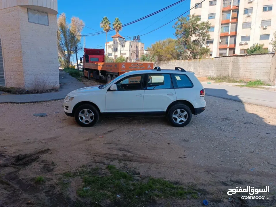 فولكس فاجن طوارق 2008 بحالة الوكالة  ماتور ديزل 3000 V6 عداد 145000 جير و ماتور و شصيات 100% وعلى ال