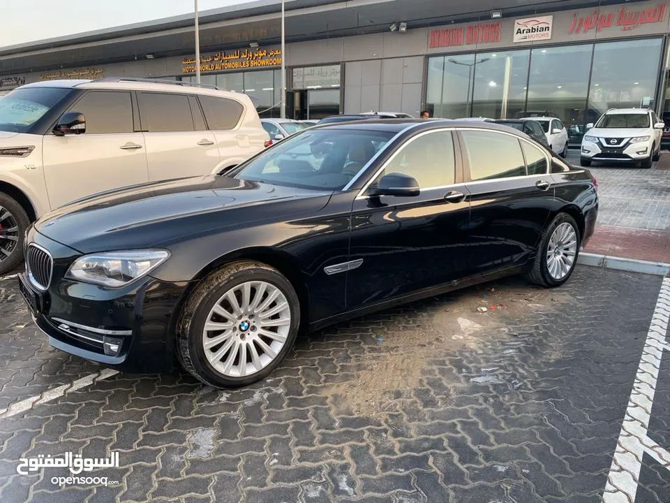 GCC Flood Free BMW 730 Li 2015 white low mileage perfect conditions