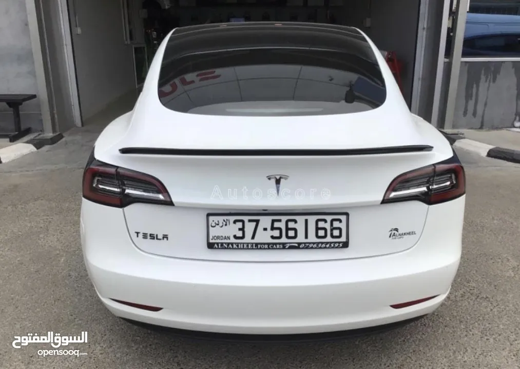 Tesla model 3 standard 2021  السيارة بحال الوكالة لا ينقصها شيء