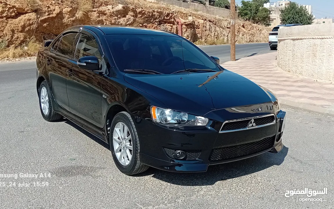 متسوبيشي لانسر فراشة موديل 2015 فحص مرفق مع الصور بحالة الوكاااااالة  ماشية 49 الف km  أصلي