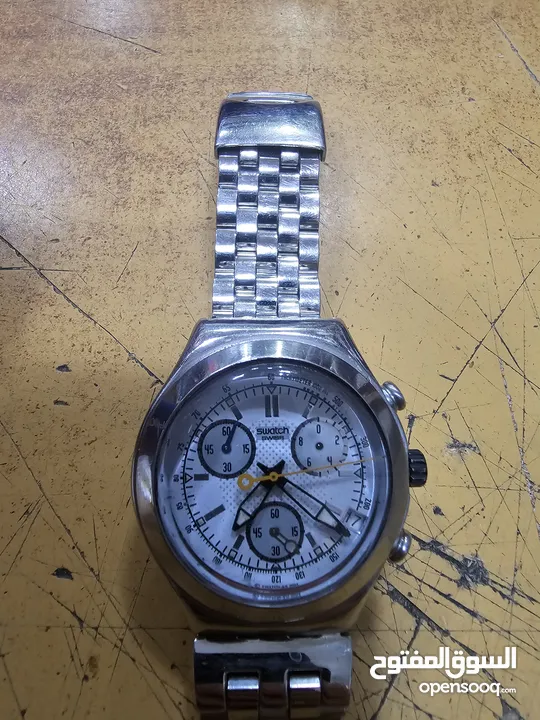 ساعة نوعها swatch irony stamless steel patented water-resistant four)(4) jewels swiss made V8