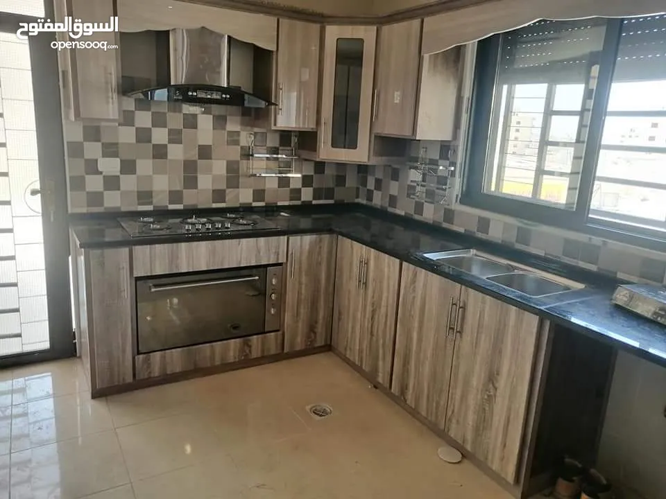 كافة انواع المطابخ المنيوم خشب شركة النموذج الموقع شارع الجامعه مجمع ابو الحاج التجاري طابق الرابع