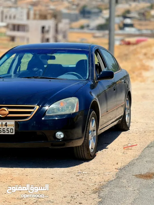 نيسان التما بنزين ماتور 2500 لون اسود