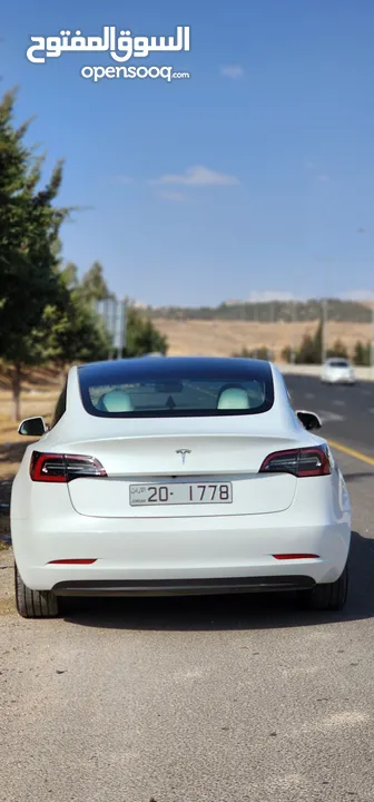 Tesla Model 3 Standerd Plus 2022 ابيض وداخليه ابيض جمرك جديد شهر 12‎ بسعر 20 الف بدون الرقم