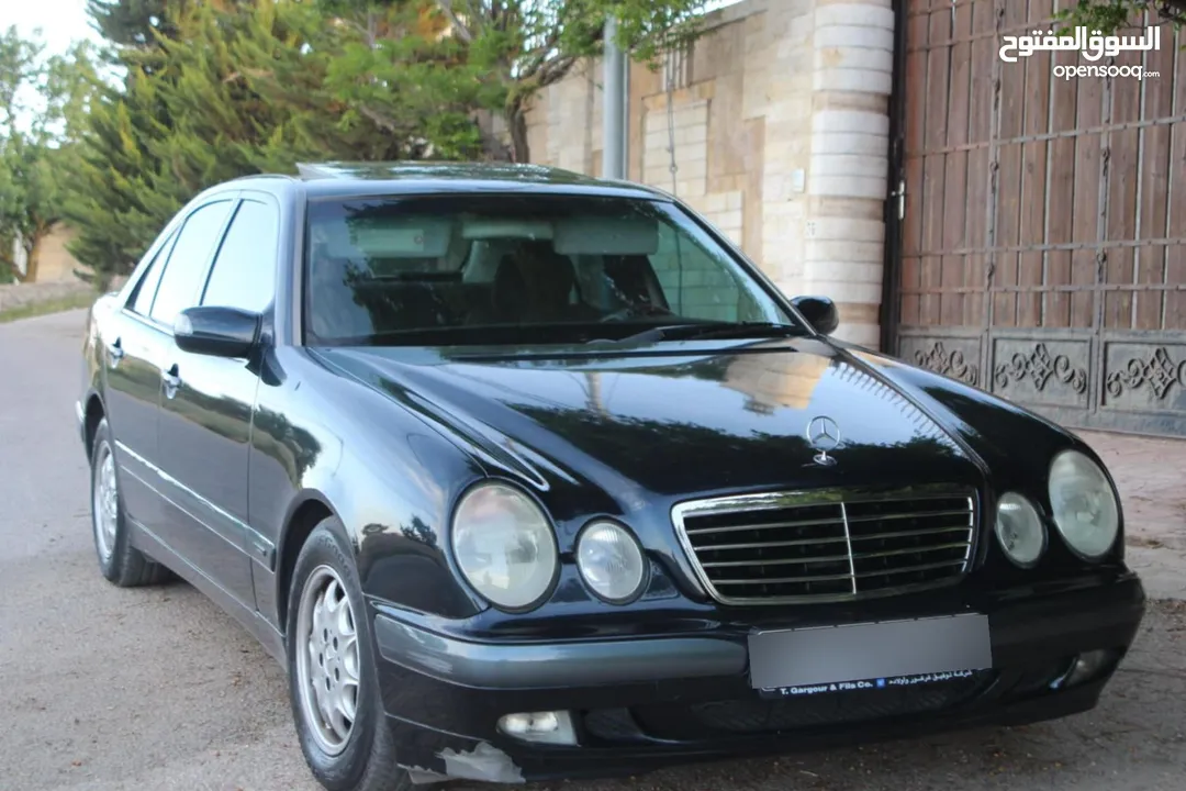 E200. 2002  قرش ونص 2002  رقم الهاتف بالوصف