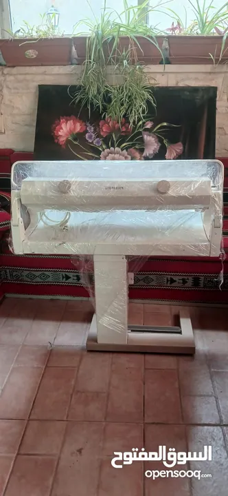 مكوى برادي يعمل عاي الكهرباء