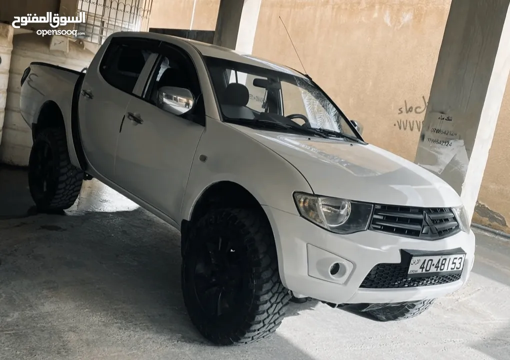 ميتسوبيشي L200 2011 + قطع