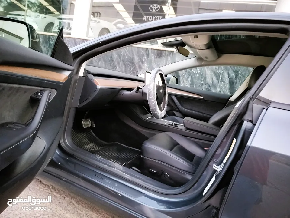 تيسلا 2023 MODEL 3 فحص كامل 4 جـيـد ممشى قليل 20 الف بحالة الوكالة لون فيراني مميز بسعر محرووق ولقطة