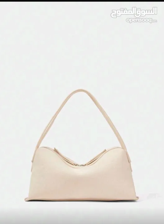 شنطة يد وسط