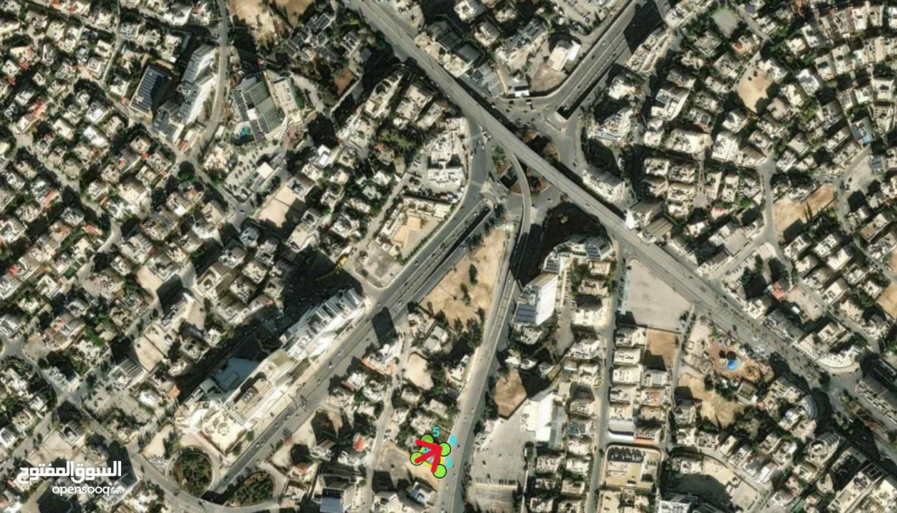قطعة ارض تجاري للبيع في العبدلي موقع مميزعلى ثلاث شوارع وقريبة من المستشفى الاسلامي