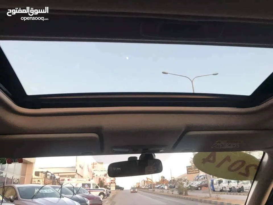 ميتسوبيشي اوتلاندر 2014 فل الفل اعلى صنف فيها كل المواصفات لون اسود ملوكي