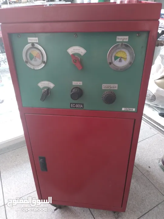 جهاز فحص سيارات  كومبيوتر وجهاز تنظيف بخاخات