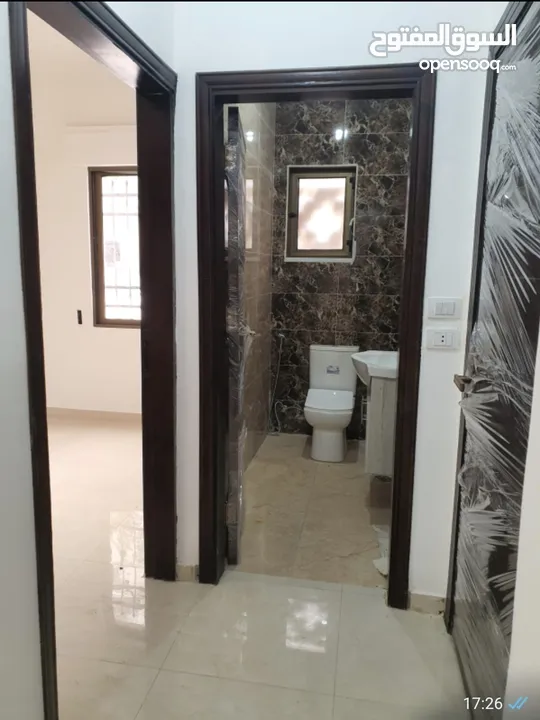 عماره جديده/4 شقق طابقيه للبيع