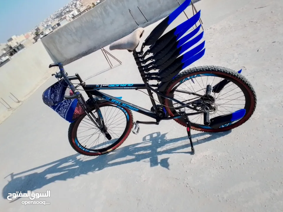 بيع بسكليت بحاله جيده جدااا اللون اسود وازرق واضح بالصوره غيارات شغاله وبرك شغال 100%