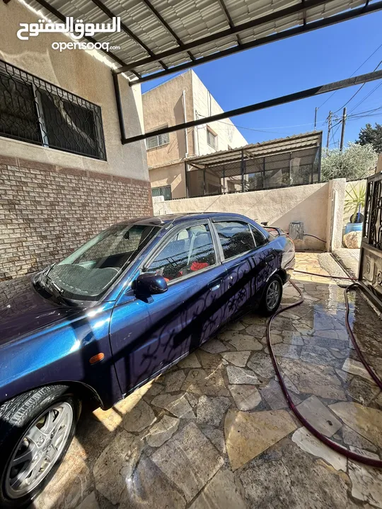 ميتسوبيشي لانسر موديل 1999