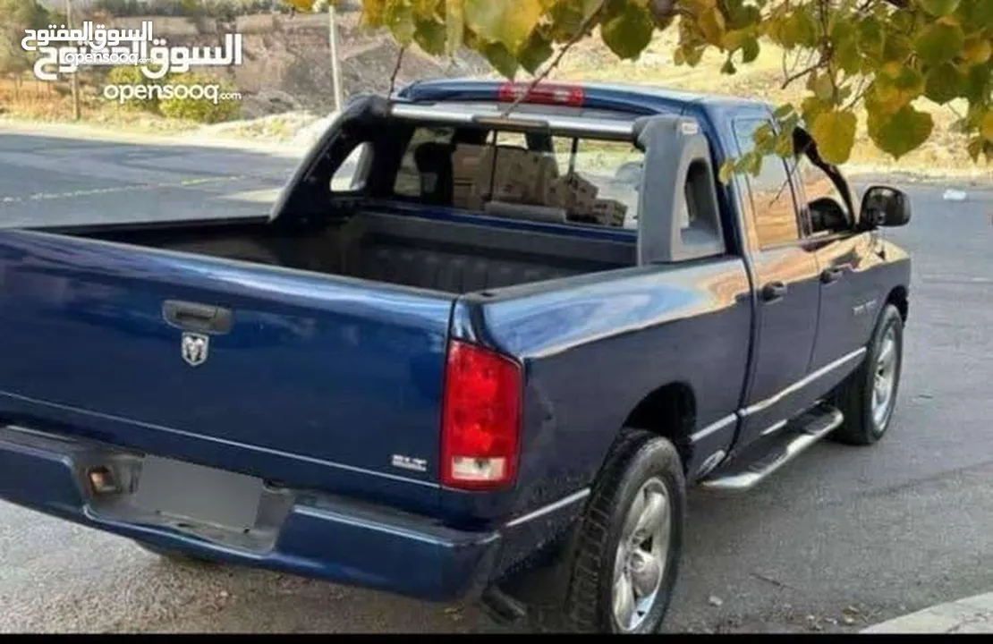 دودج رام 2005 فل الفل ما شاء الله عليه لون ازرق ، هيمي 6 ركاب ماتور 5700 فحص 4 جيد ضربات خفيفة بودي