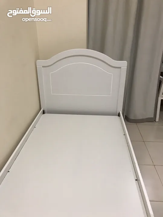 Single new white bed