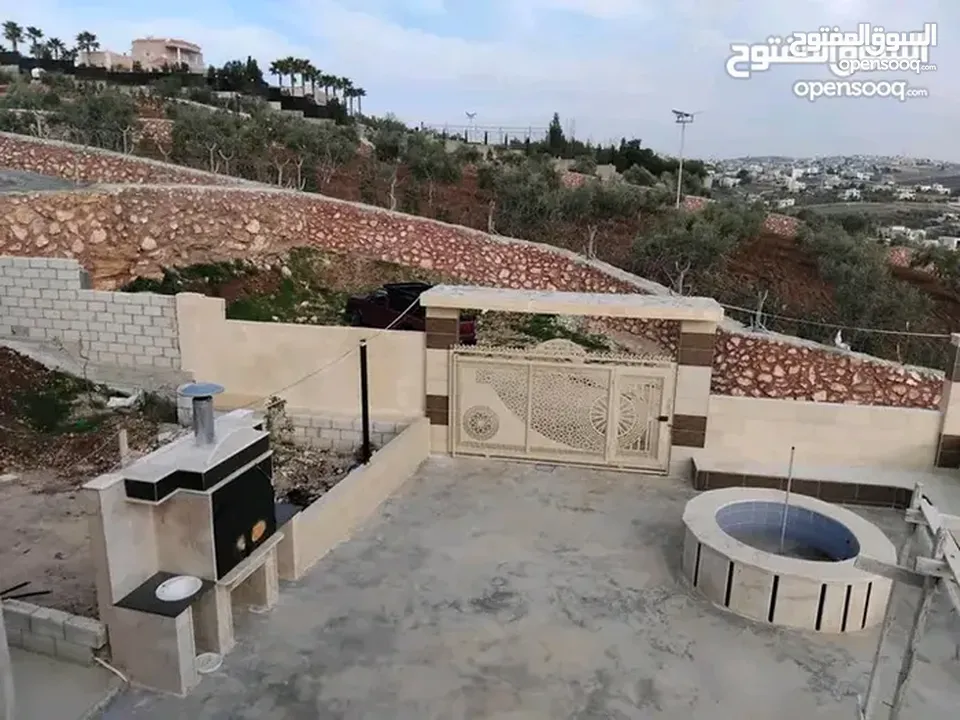 قطعة ارض مع بيت للبيع