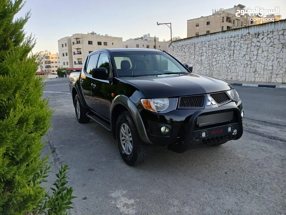 متسوبيشي l200 سبورتيرو 2008 جير اتوماتيك  فور ويل فحص ممتاز وفل كامل بدون فتحات