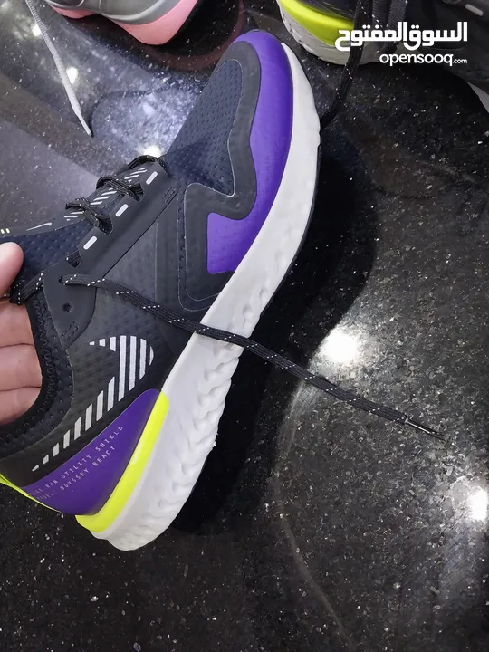حذاء مشي او جري لمسافات كبيره نايك اصلي NIKE جدبد غير مستعمل مقاس 37.5  مقاوم للماء قابل لتنفس