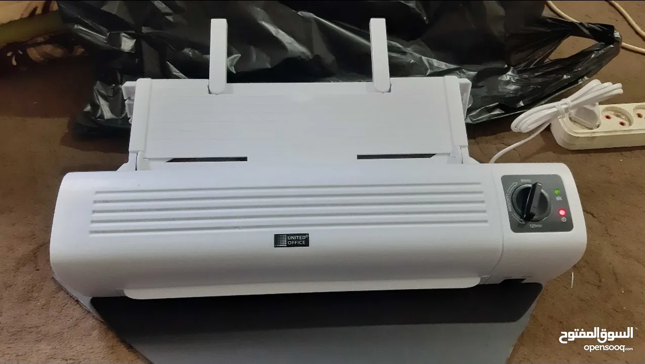 ماكينة تغليف حراري المعروفة بي laminator , تغليف البطاقات الشخصية