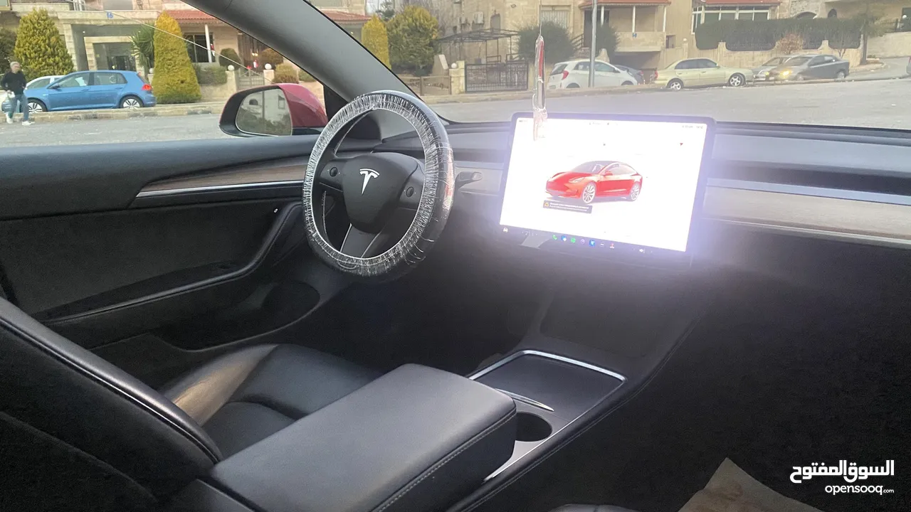 Tesla model 3 2022 standard plus/7 جيد / اتوسكور A/ عداد قليل كاش وبالاقساط