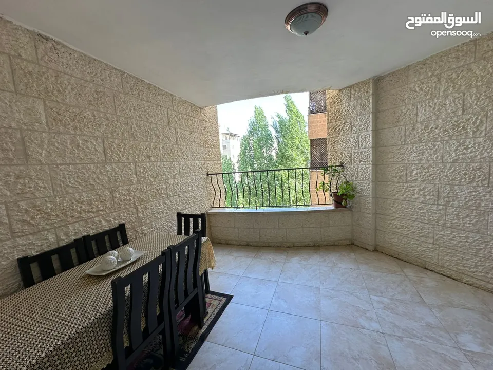 شقة للبيع - عين منجد - وحيدة بطابقها - 170م - بالقرب من سوبرماركت بغداد