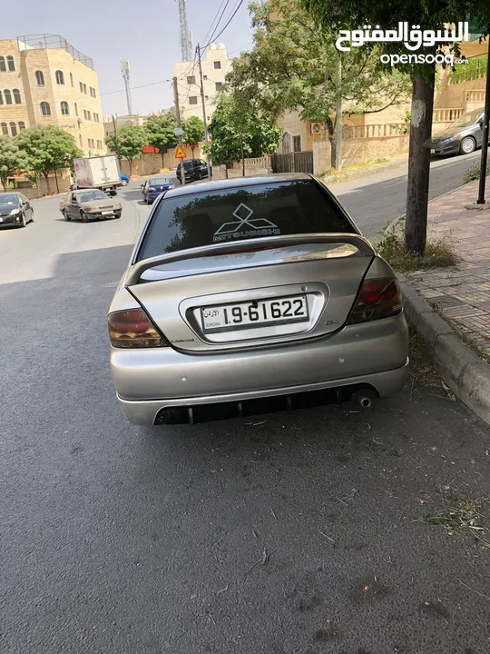 لانسر 2004 مميزه