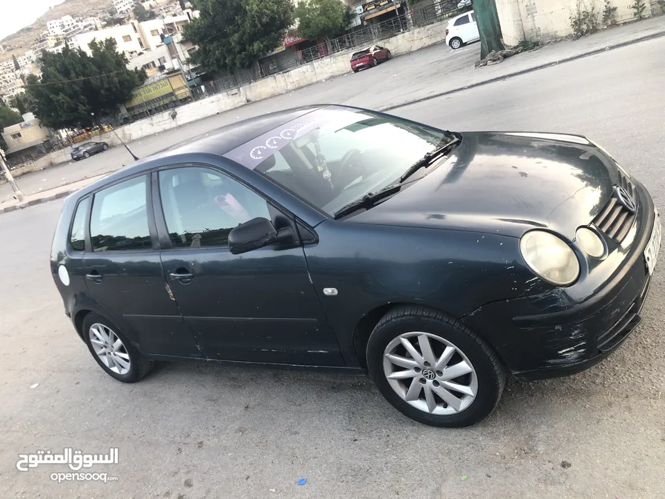 polo 2003  اللون الزيتي