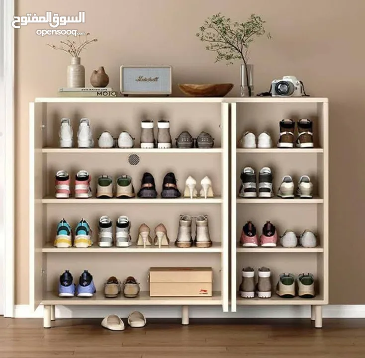 خزانة احذية حليب مزخرفة بشكل اقواس