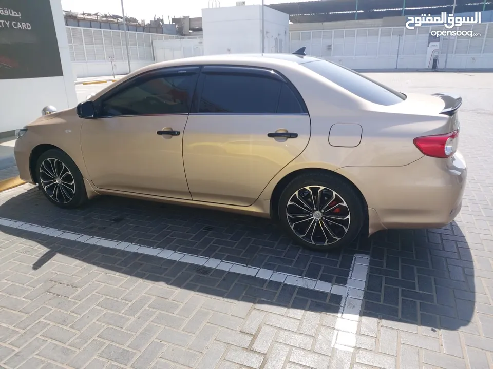 toyota corolla 2013 with  Lexus style bumper