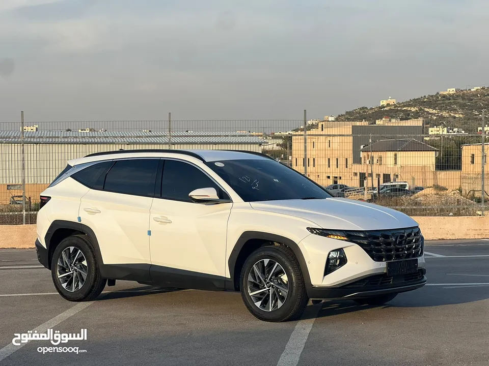 هونداي توسان /2022 فل الفل بدون فتحة سقف  2x4 ///240Hp بنزين + كهرباء  ( Haybrid) 1600cc
