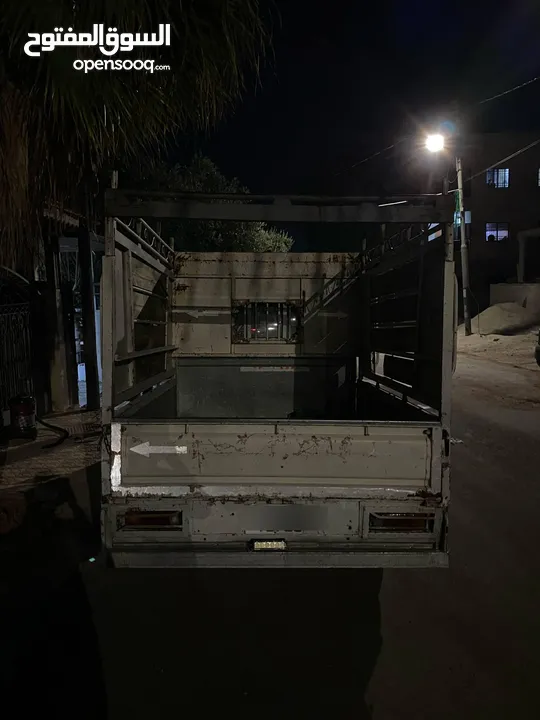 كيا بنجو لون ابيض 2003