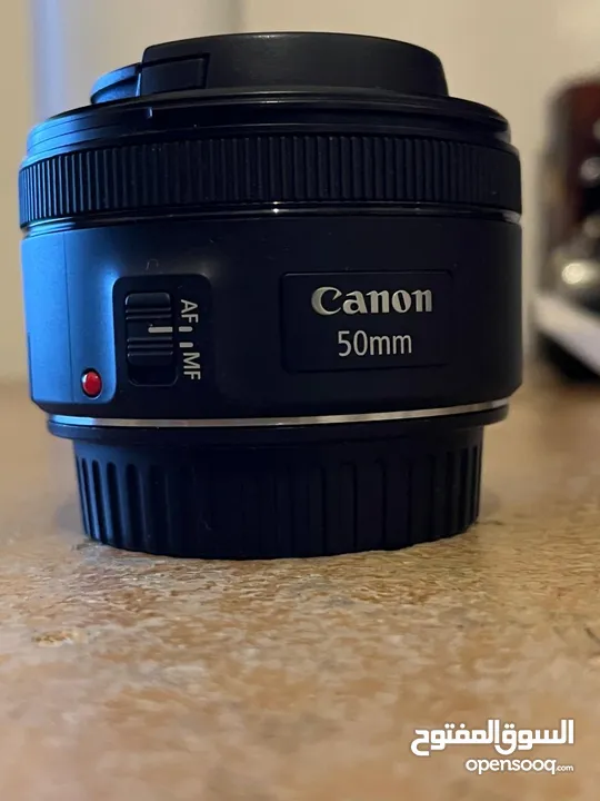 Canon EOS 800D w/ Kit Lens, 50mm f/1.8 Lens, Tripod, Battery & Charger, Laptop Cable, Backpack
